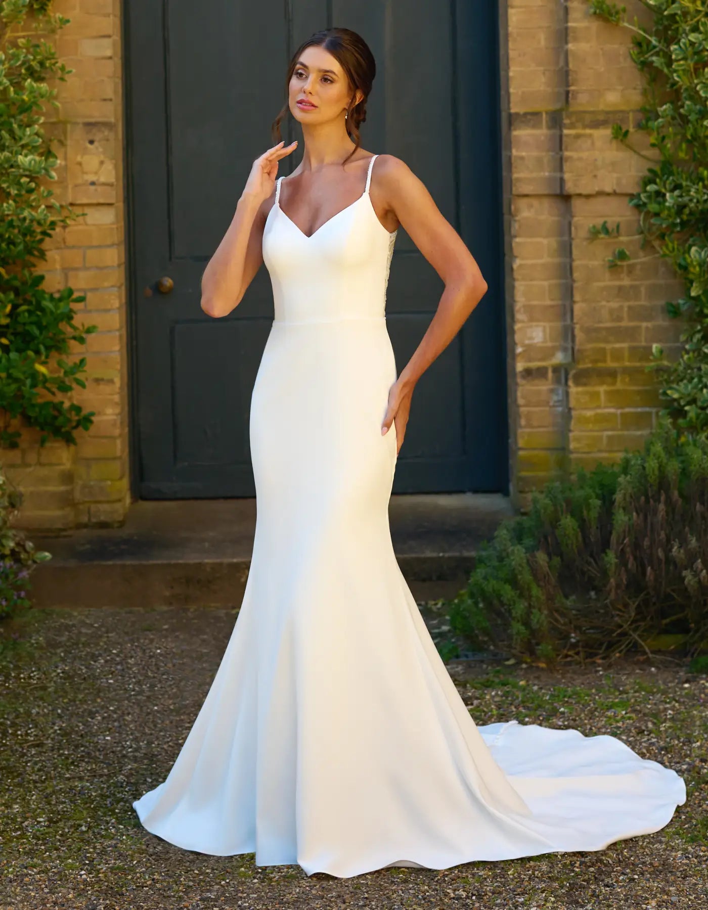 a crepe wedding dress with illusion back