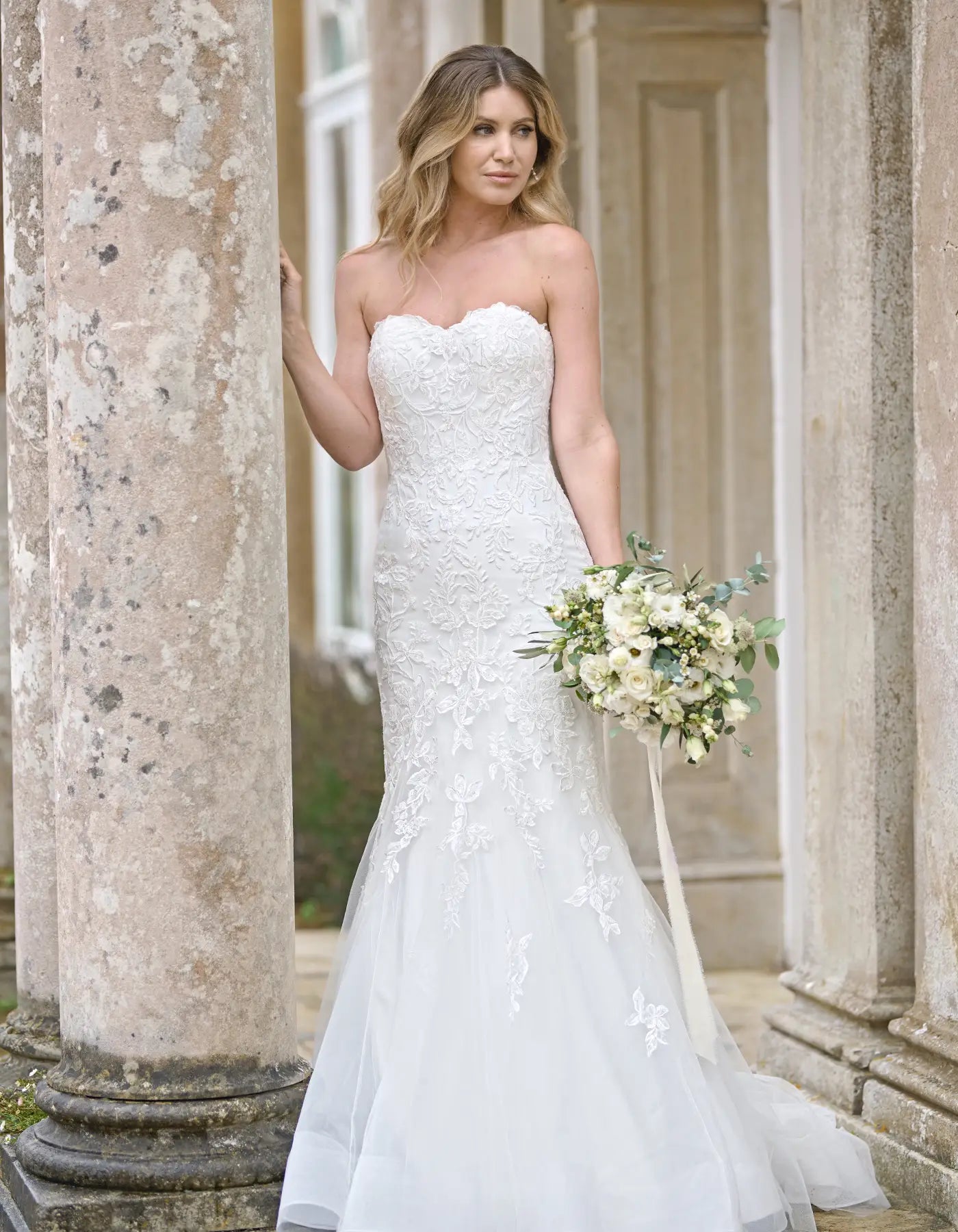 a lace mermaid wedding dress